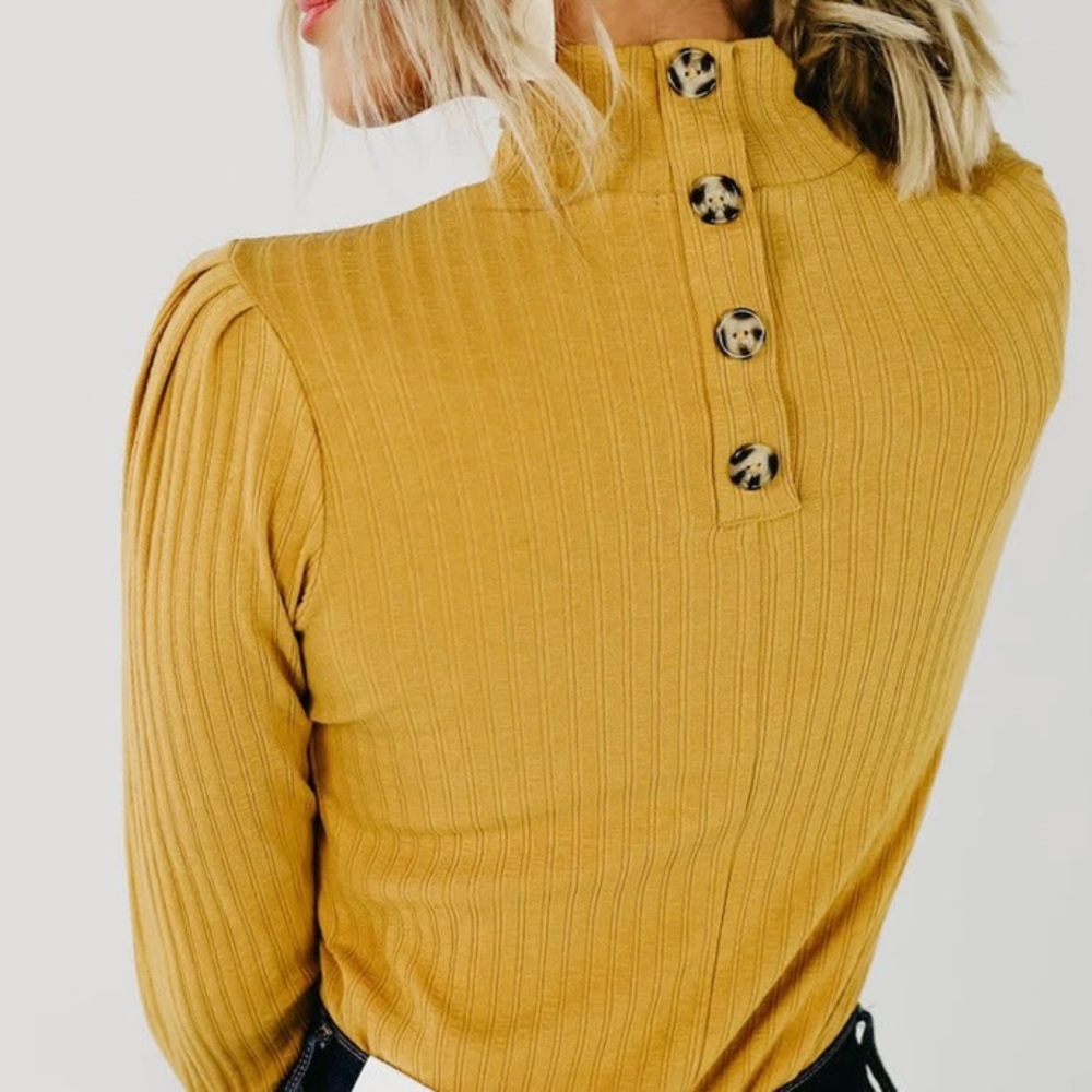 Yellow button back shirt